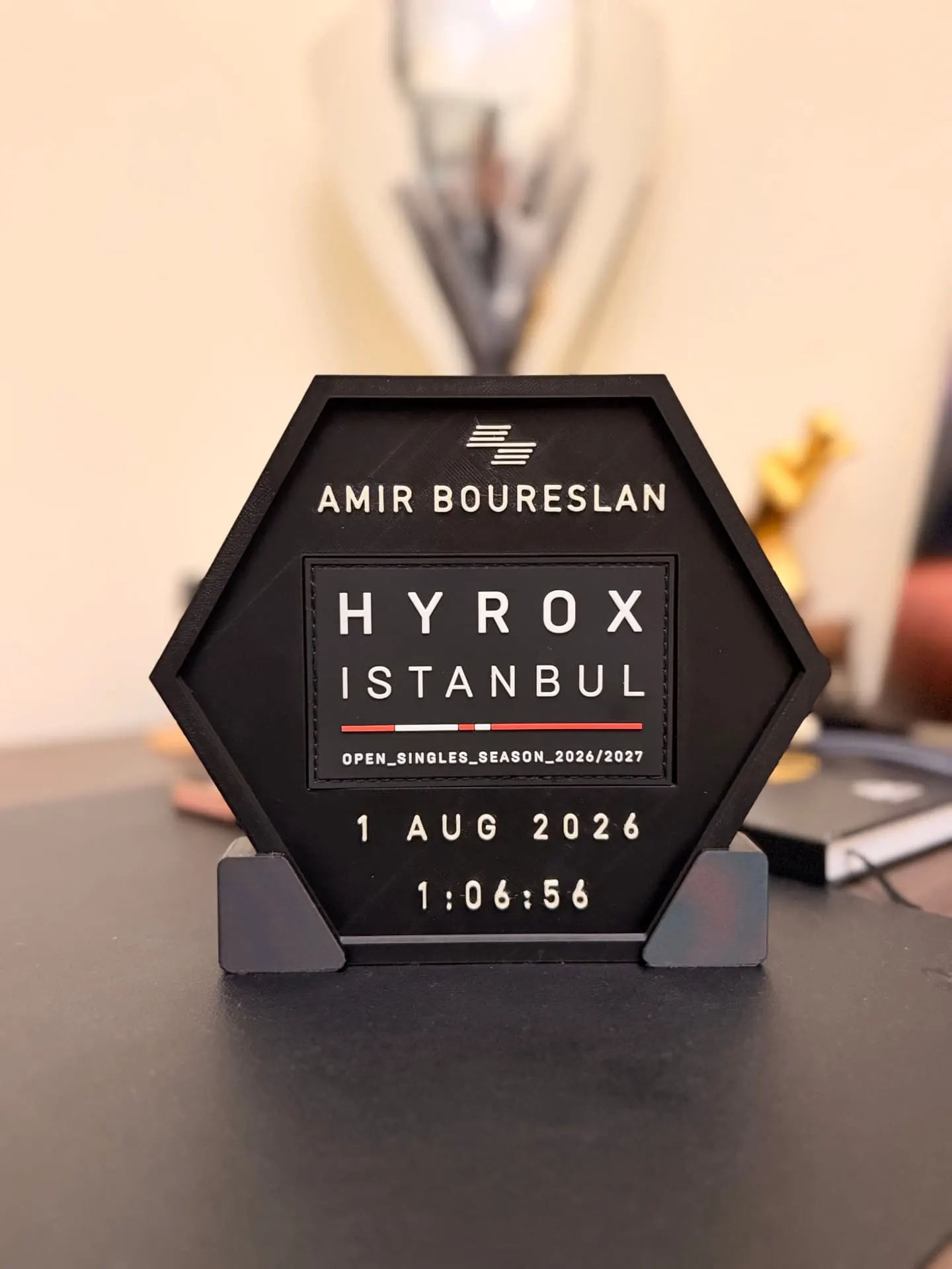 HYROX Istanbul — Open Singles 2026/2027 — Black hex display with race date and finish time.
