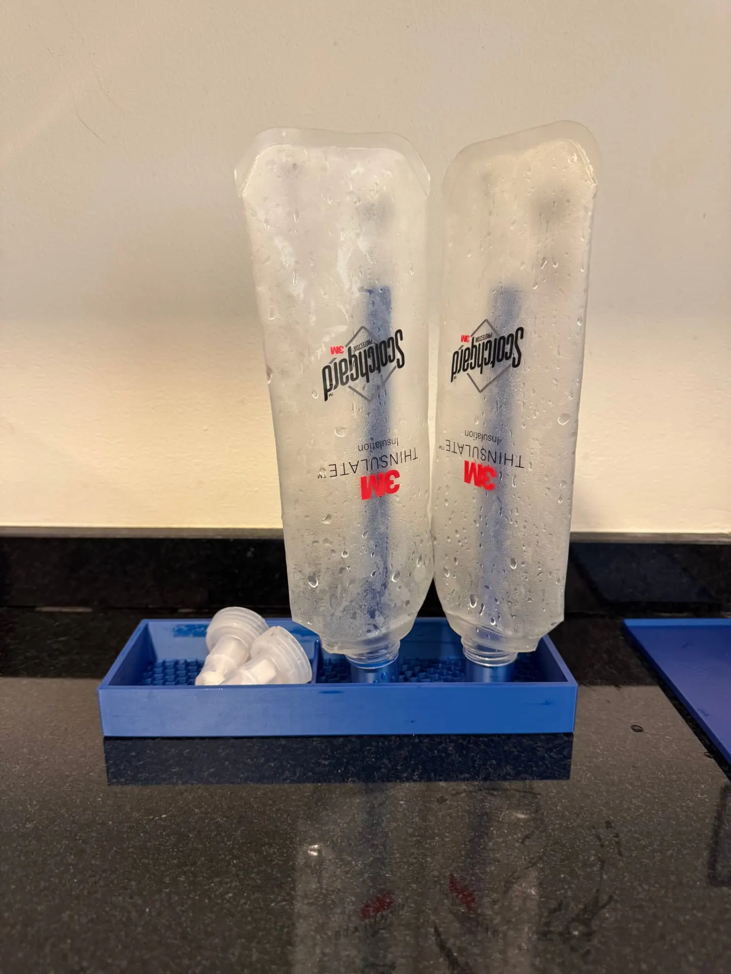 Soft Flask Drying Stand — Everyday Use — Blue stand drying flasks and bite valves after a run.