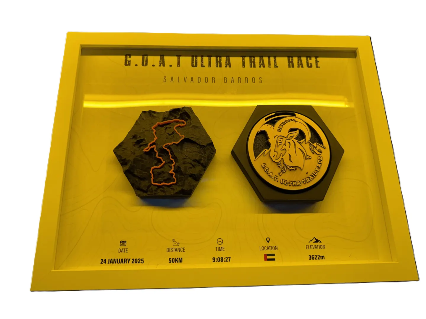 GOAT ULTRA TRAIL RACE 50KM — WHITE FRAME — 50KM finisher medal display with a 3D Printed relief in a bold white frame.